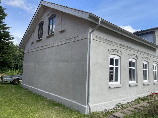 Færdigrenoveret facade udført af murer i Sønderjylland